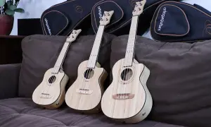Trzy ukulele: koncertowe i sopranowe, gotowe do muzycznej podróży.