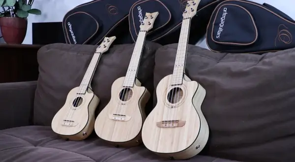 Trzy ukulele: koncertowe i sopranowe, gotowe do muzycznej podróży.