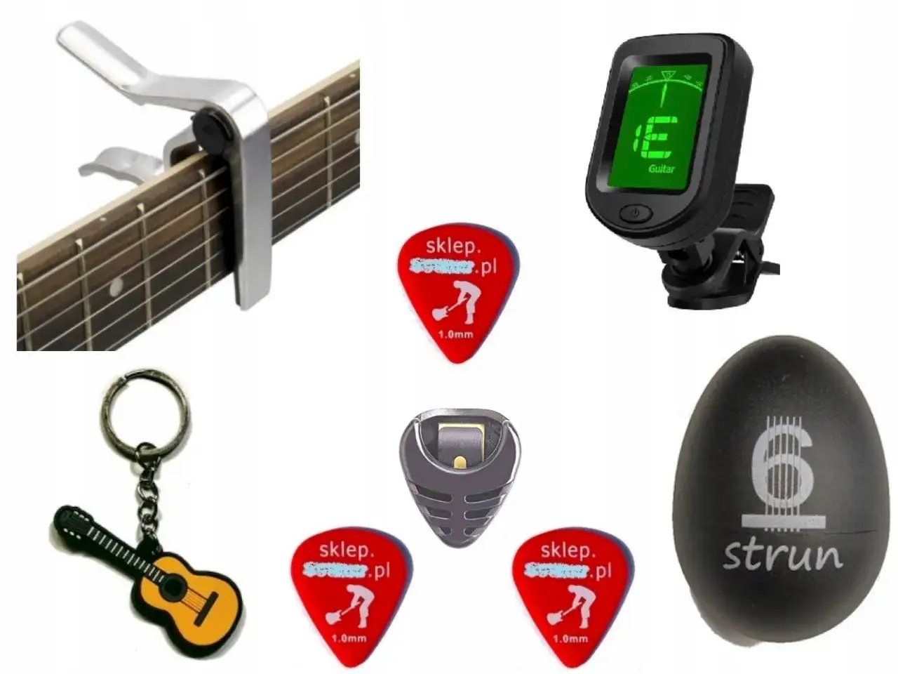 Zestaw akcesoriów gitarowych: kapodaster, stroik, kostki, breloczek w kształcie gitary i pojemnik na kostki.